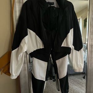 2 piece black an white track suit